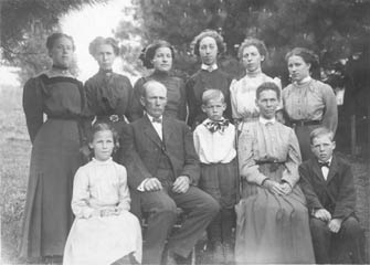 Nancy Emmaline Pickard and John Eakin Cochran with 9 children